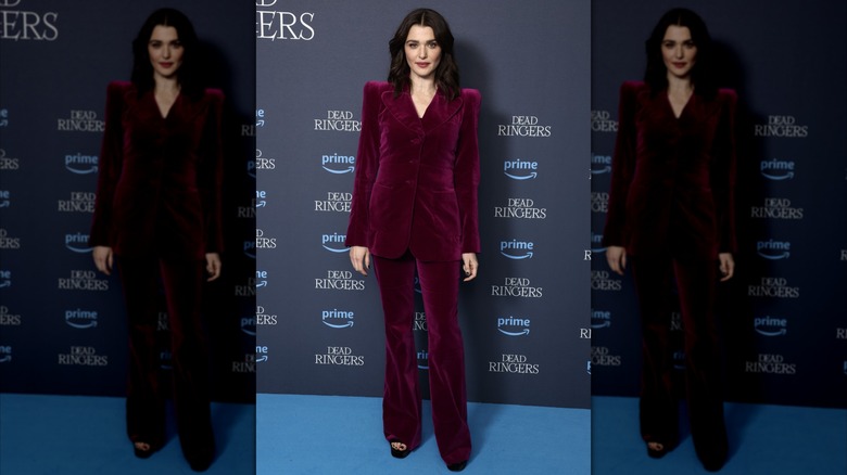 Rachel Weisz in a burgundy velvet suit on the red carpet