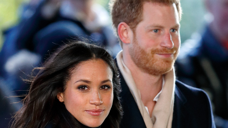 Meghan and Harry walking