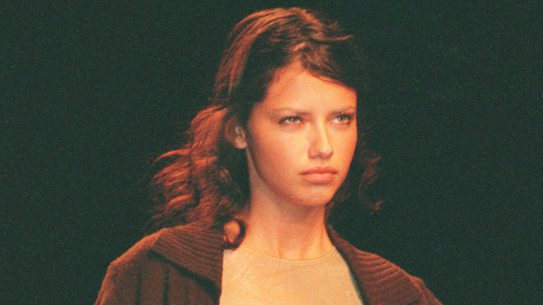 A young Adriana Lima modeling on catwalk
