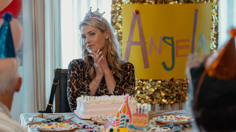 Ali Larter wearing a crown in a scene from "Landman"