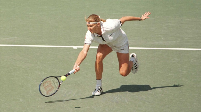 Anna Kournikova playing tennis in 1996
