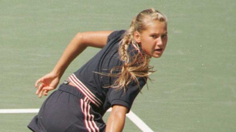 Anna Kournikova returns serve in 1996