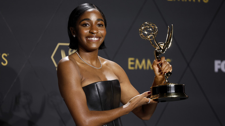 Ayo Edebiri with Emmy award