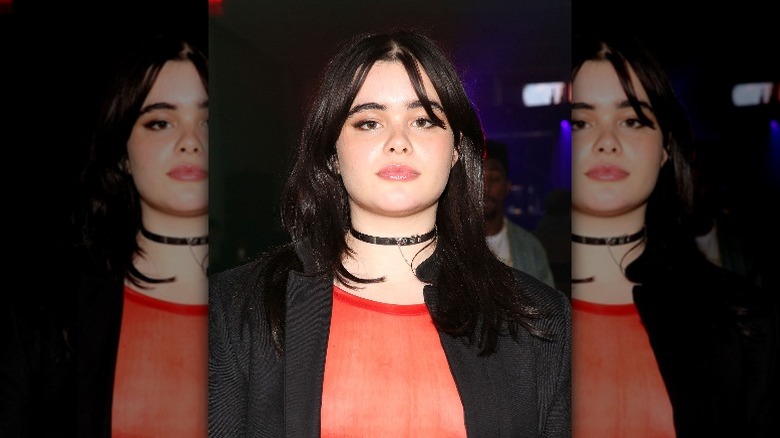 Barbie Ferreira wearing orange shirt