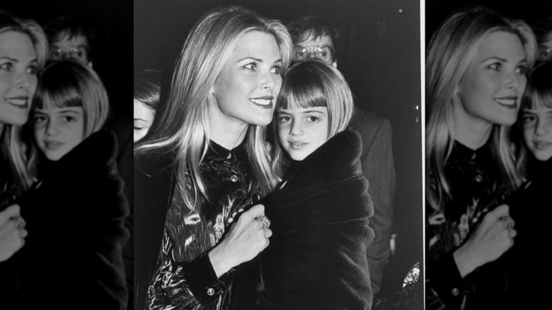 Christie Brinkley holding a young Alexa Ray Joel