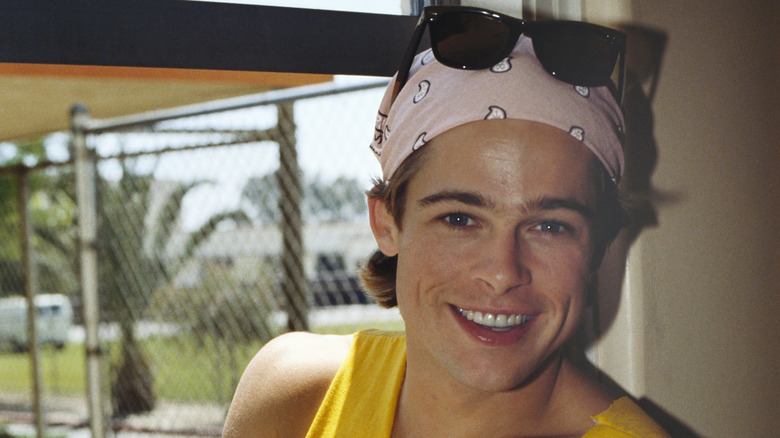 Brad Pitt wearing a bandana, sunglasses