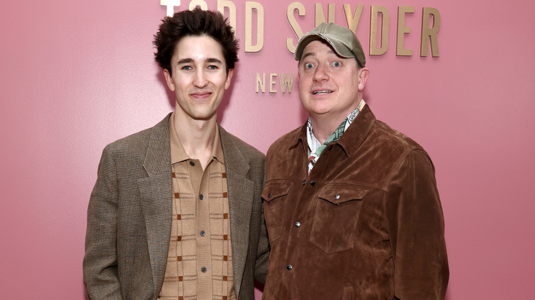 Brendan and Holden Fraser pose at the Todd Snyder fashion show