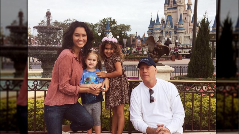 Emma Heming Willis and Bruce Willis with their daughters at Disney