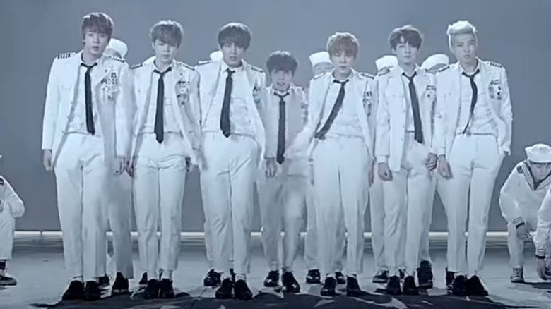 BTS performing in sailor outfits.