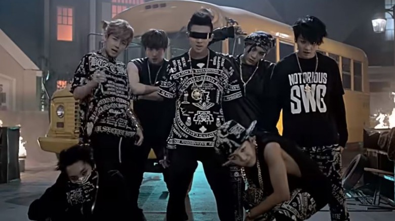 BTS posing in a music video