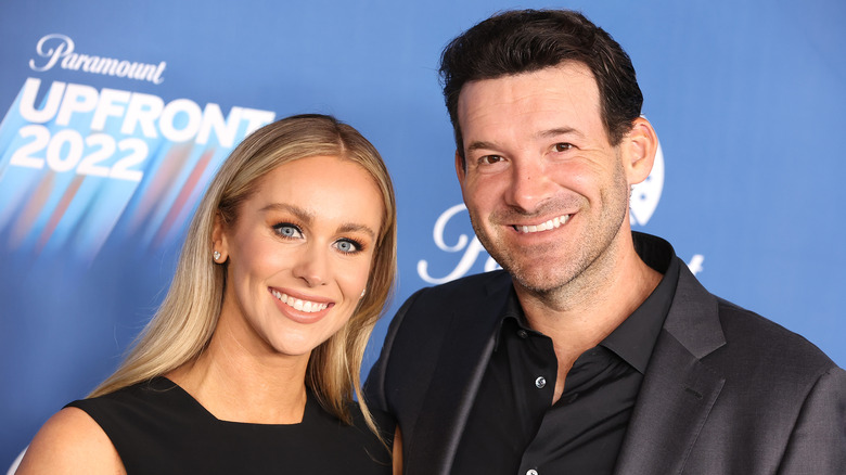 Candice Crawford Romo smiling with Tony Romo