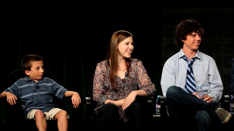 Atticus Shaffer, Eden Sher, and Charlie McDermott getting interviewed