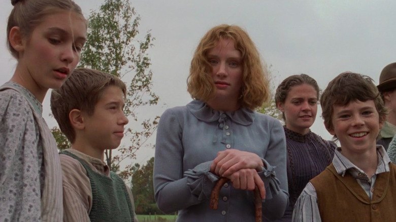 Scene from The Village with Bryce Dallas Howard (center) and Charlie McDermott (right)