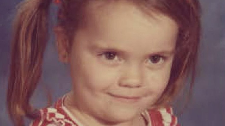 Christina Ricci smiles as a little girl