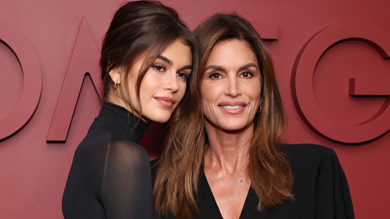 Kaia Gerber and Cindy Crawford smiling on a recent red carpet together.