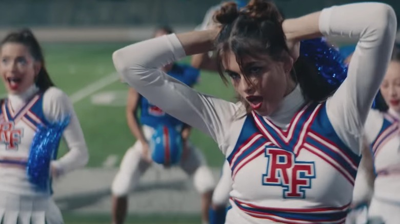 Kaia Gerber playing a cheerleader in the movie Bottoms.