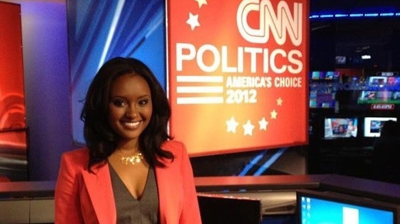 A young Rahel Solomon smiles during grad school in 2012 as she interns at CNN on set during the election