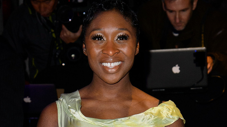 Cynthia Erivo as a younger woman smirking