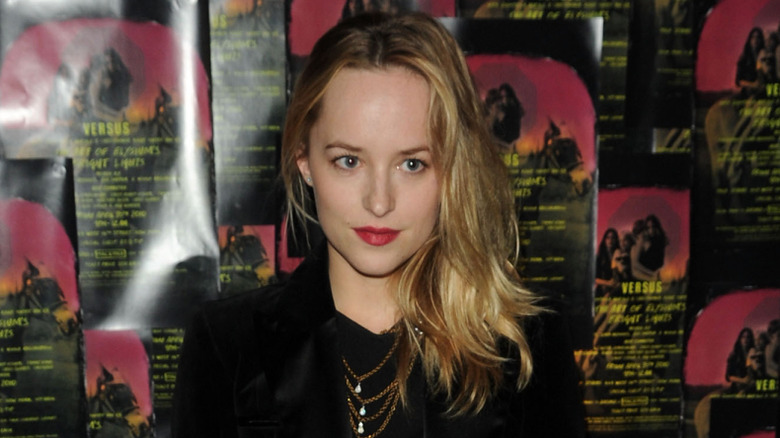 Dakota Johnson posing at event