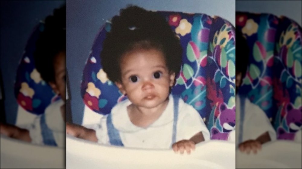 A baby photo of performing artist Doja Cat