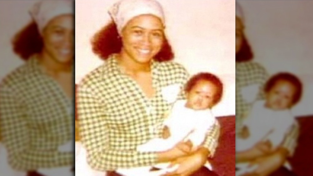 Eve as a baby with her mom