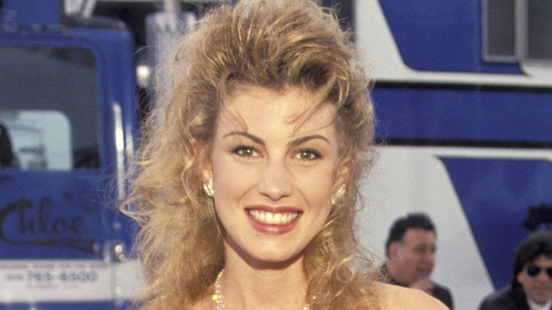 Closeup of Faith Hill smiling in the '90s