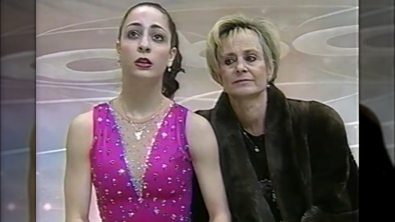 Deanna Stellato and her coach awaiting her scores at the US National championships in 2000