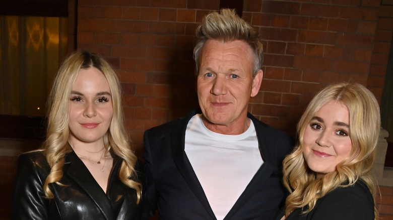 Gordon Ramsay, Holly Ramsay, and Tilly Ramsay smiling at the GQ Food & Drink Awards in 2023