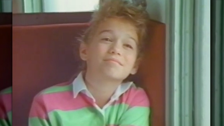 Bethany Joy Lenz sitting on a train