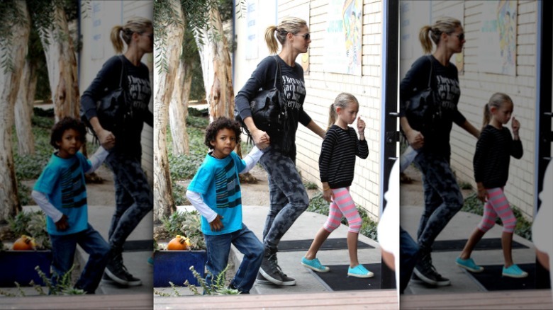 Heidi Klum walking with her son and daughter in 2012