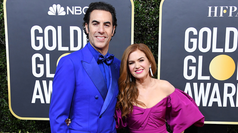 Sacha Baron Cohen and Isla Fisher smiling