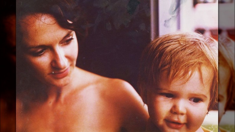 Young Isla Fisher with her mother