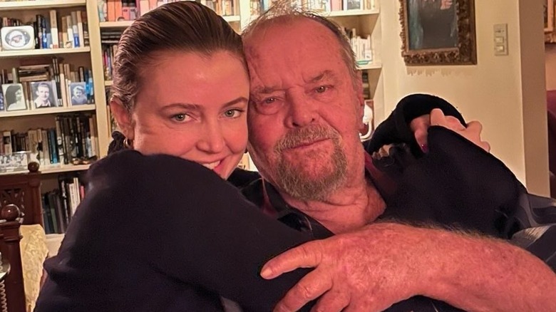 Lorraine Nicholson hugging her dad, Jack Nicholson