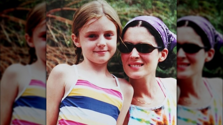 Lorraine Nicholson as a child, smiling with Lara Flynn Bloyle
