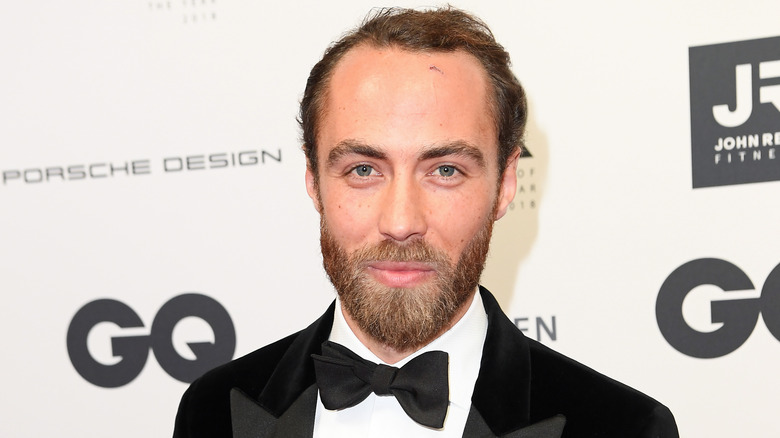 James Middleton looking into camera