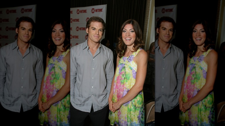 "Dexter" co-stars Michael C. Hall and Jennifer Carpenter posing near a Showtime banner