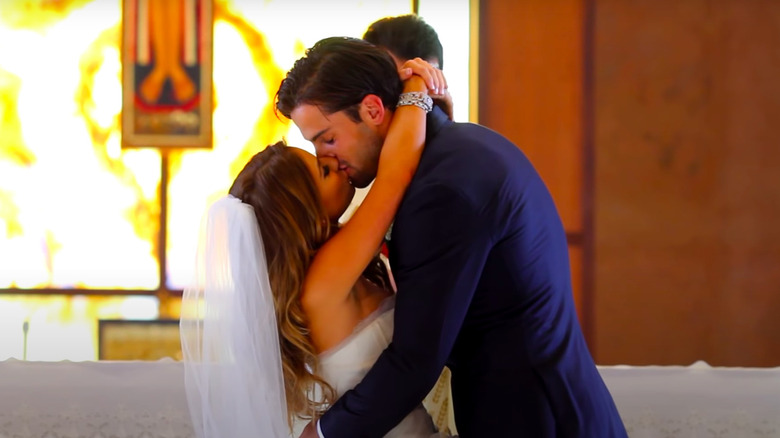 Jessie James Decker kissing on wedding day