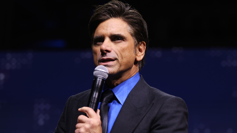 John Stamos speaks onstage