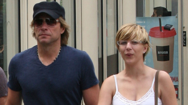 Bon Jovi and Stephanie Rose walking down the streets of New York City