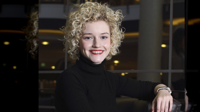 Julia Garner smiling at the Berlin International Film Festival