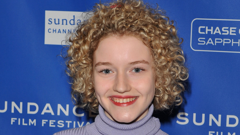 Julia Garner smiling at the premiere of Martha Marcy May Marlene