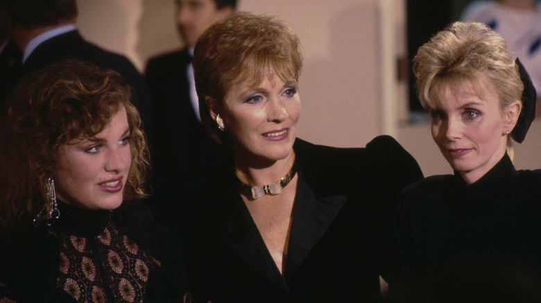 Emma Walton Hamilton, Julie Andrews, and Jennifer Edwards smiling at the Golden Globes in 1987