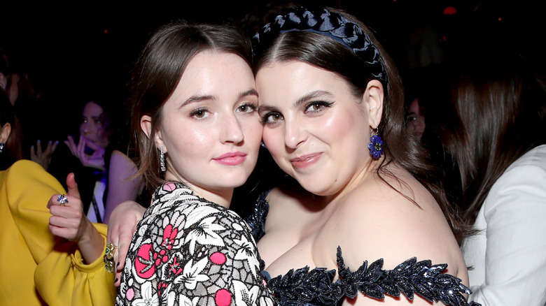 Kaitlyn Dever and Beanie Feldstein posing at the Golden Globes