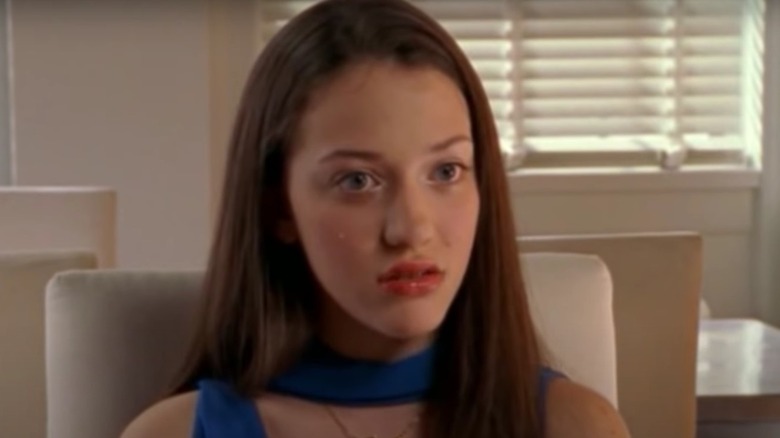 Kat Dennings staring straight ahead