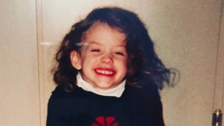 Kat Dennings as a child