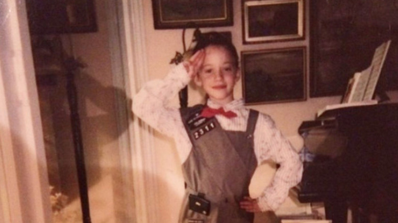 Young Kat Dennings in girl scouts