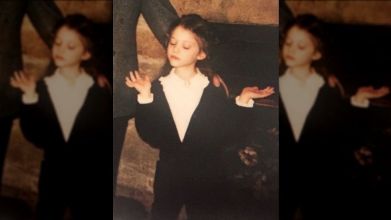 Kat Dennings as a child