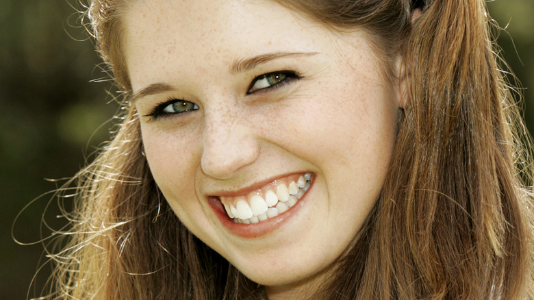 young Katherine Schwarzenegger smiling