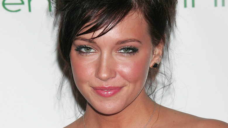 Katie Cassidy with dark hair