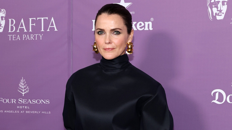 Keri Russell posing on step-and-repeat